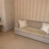Photo 2: Sitting room with work space