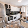 Photo 5: Large fully equipped kitchen dinner