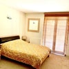 Photo 5: Master bedroom leading to garden