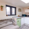 Photo 2: Kitchen and sitting space 