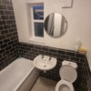 Photo 9: bathroom and