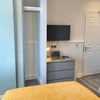 Photo 2: Room 1 - large, built-in wardrobe & Smart TV