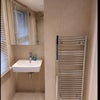 Photo 4: Bright, clean bathroom