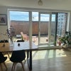 Photo 5: Open plan living room and terrace