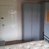 Photo 9: Double room with fitted hanging space.