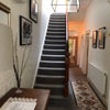 Photo 6: Hallway to first floor