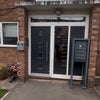 Photo 9: Apartment Front Enterance