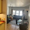 Photo 5: View from the kitchen - dining table and chairs stay.
