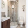 Photo 6: full ensuite to orange decor room £925
