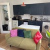 Photo 3: Shared living room/kitchen