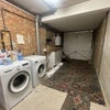 Photo 13: Communal Garage with Washing Machine & Tumble Dryer