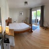 Photo 6: Room for rent showing bed and balcony