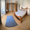 Photo 5: Room for rent showing bed and wardrobes