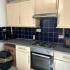 Photo 6: Kitchen (sink, boiler & washing mashine on other side)