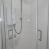 Photo 5: Shares a clean and modern bathroom with one other person