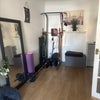 Photo 8: Living room with some gym equipment