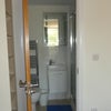 Photo 4: en suite with toilet/sink and shower room