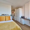 Photo 3: Self-contained kitchen, bathroom and living space