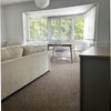 Photo 2: Light, open sitting room