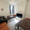 Photo 9: Lounge/common area