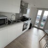 Photo 6: Upstairs Kitchen ( They Added Fridge now!)
