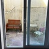 Photo 7: shared patio outside kitchen