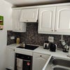 Photo 4: Kitchen (left side)