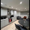 Photo 6: Kitchen and shared living area 