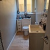 Photo 7: Separate WC with washing basin mirror and shaving point