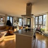 Photo 2: Living area and open plan kitchen