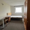 Photo 3: Bedroom 1: double bed, 2 desks+chair, warsrobe, chest of drawers, bedside cabinet