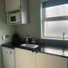 Photo 3: Kitchen area of studio 