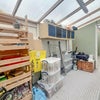 Photo 3: Utility Room (extends further with sink and washing machines)