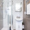 Photo 2: Enjoy a refreshing shower in the modern shower, with complimentary toiletries provided.