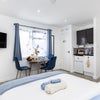 Photo 8: A calm and inviting bedroom, finished in soft blue tones for a relaxing stay