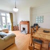 Photo 8: Tv/dining room 