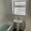 Photo 9: DOWNSTAIRS SHOWER AND LOO