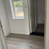 Photo 4: Storage rooms downstairs 