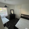 Photo 6: The room available, fully furnished. Storage includes small closet, cupboard and bookshelf. Roomy de