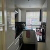 Photo 4: Kitchen, with fridge/freezer, oven, air fryer and espresso machine. 