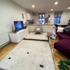 Photo 7: Sofa/kitchen area