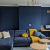 Photo 5: We are in the process of painting the lounge wall blue, this is how it should look like