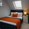 Photo 5: Double ottoman style bed with underbed storage