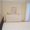 Photo 8:     Bedroom storage angle — Generous bedroom with plenty of space for storage and furnishings