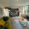 Photo 3: Shared, large living room. 