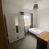 Photo 4: Double bed with plenty of storage underneath.  