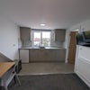 Photo 2: Bedroom 6: kitchen with oven and hob