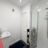 Photo 2: Room 3 - Shower and sink