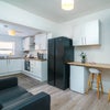 Photo 2: Spacious area with breakfast bar