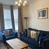 Photo 4: Living area. Room 1